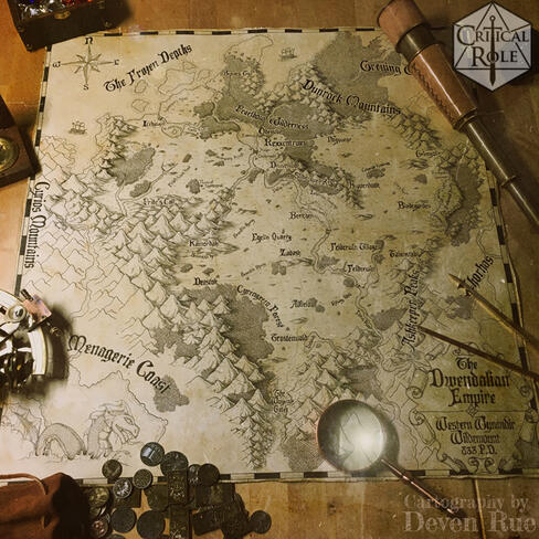 A vintage looking photo of a map of the Dwendalian Empire surrounded by coins, gems, and navigation tools. The Dwendalian Empire is a part of the fictional world of Exandria from Critical Role.